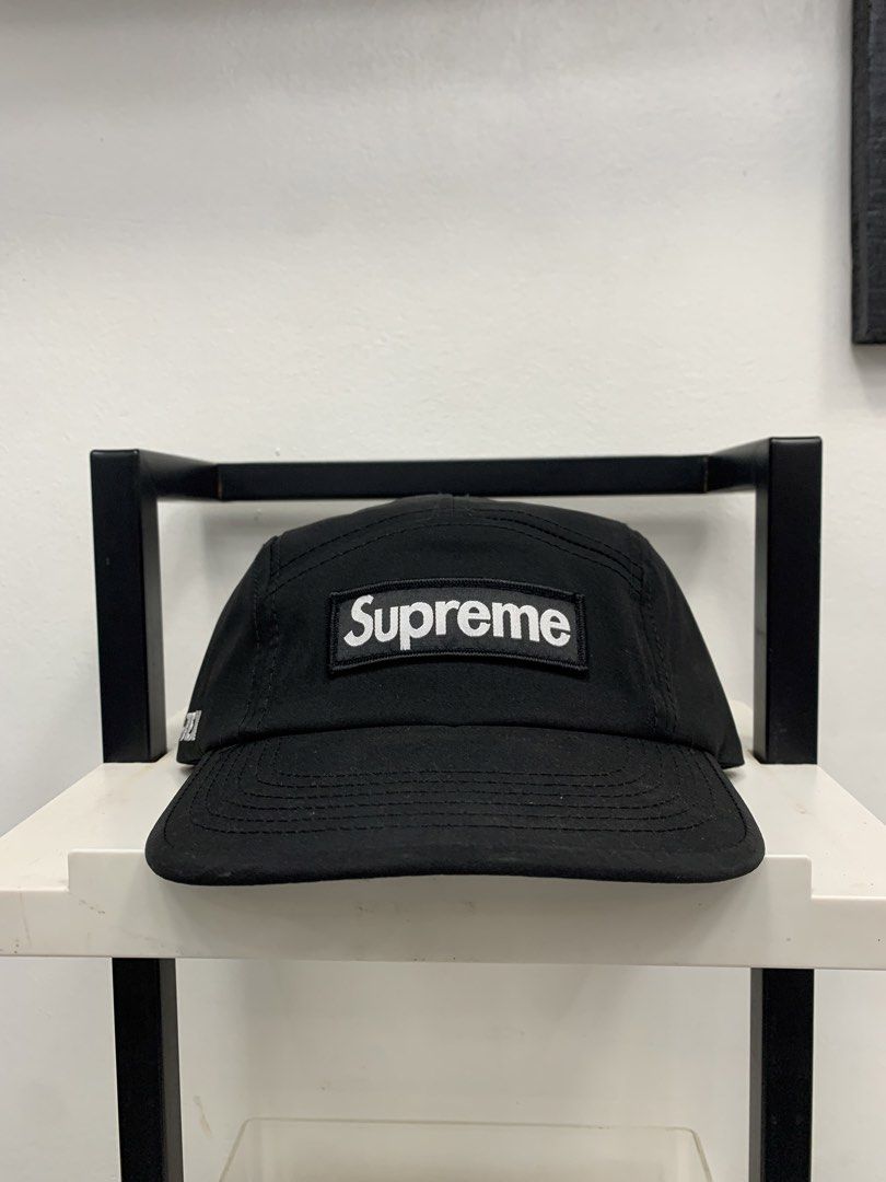 Supreme Gore-Tex 5-Panel Camp Cap Black (Category: Caps & Hats) located in Cavite. Submitted by jeromeaba95864 (Listing ID 1457504846, Image 1). Description: - Authentic Black Supreme 5-panel cap - Features water-resistant Gore-Tex material - Adjustable strap with buckle closure at the back - Size: Small/Medium - Ideal for everyday wear.