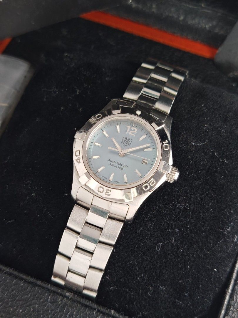 Tag Heuer Aquaracer 27mm (Category: Women's Watches) located in San Juan City. Submitted by MW_888 (Listing ID 1457476026, Image 1). Description: Tag Heuer Aquaracer 27mm Blue mother of pearl dial Quartz 2010, Timetrend AD Ref WAF1417 9/10 condition Inclusions : watch, original steel bracelet with complete links, manual, booklet holder, Tag Heuer guarantee card and original Tga Heuer double box *photo reference on 6.5" wrist *brand new batter ins