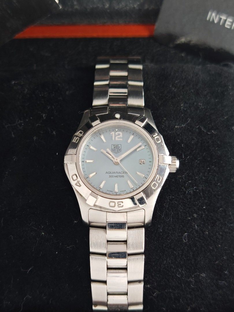 Tag Heuer Aquaracer 27mm (Category: Women's Watches) located in San Juan City. Submitted by MW_888 (Listing ID 1457476026, Image 2). Description: Tag Heuer Aquaracer 27mm Blue mother of pearl dial Quartz 2010, Timetrend AD Ref WAF1417 9/10 condition Inclusions : watch, original steel bracelet with complete links, manual, booklet holder, Tag Heuer guarantee card and original Tga Heuer double box *photo reference on 6.5" wrist *brand new batter ins