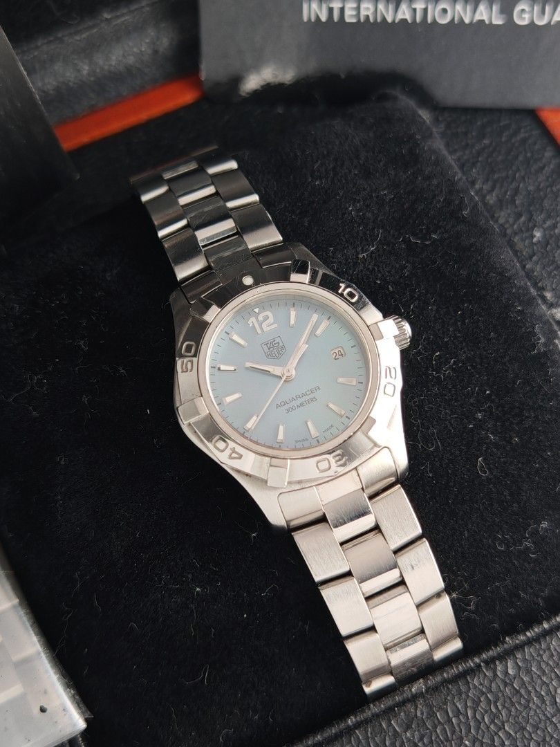 Tag Heuer Aquaracer 27mm (Category: Women's Watches) located in San Juan City. Submitted by MW_888 (Listing ID 1457476026, Image 3). Description: Tag Heuer Aquaracer 27mm Blue mother of pearl dial Quartz 2010, Timetrend AD Ref WAF1417 9/10 condition Inclusions : watch, original steel bracelet with complete links, manual, booklet holder, Tag Heuer guarantee card and original Tga Heuer double box *photo reference on 6.5" wrist *brand new batter ins