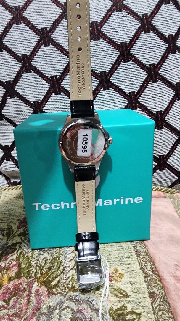 TechnoMarine Watch with Black Leather Strap (Category: Women's Watches) located in San Rafael. Submitted by mhaya31 (Listing ID 1457348470, Image 2). Description: - Brand: TechnoMarine - Dial Color: Black - Strap Material: Genuine Black Leather - Water Resistance: Yes - Includes: Original Box - Style: Versatile for everyday or special occasions 🇺🇸 Bought in the USA 💰 Money-Back Guarantee Authentic • USA Purchased • Shop with Confidence Origina