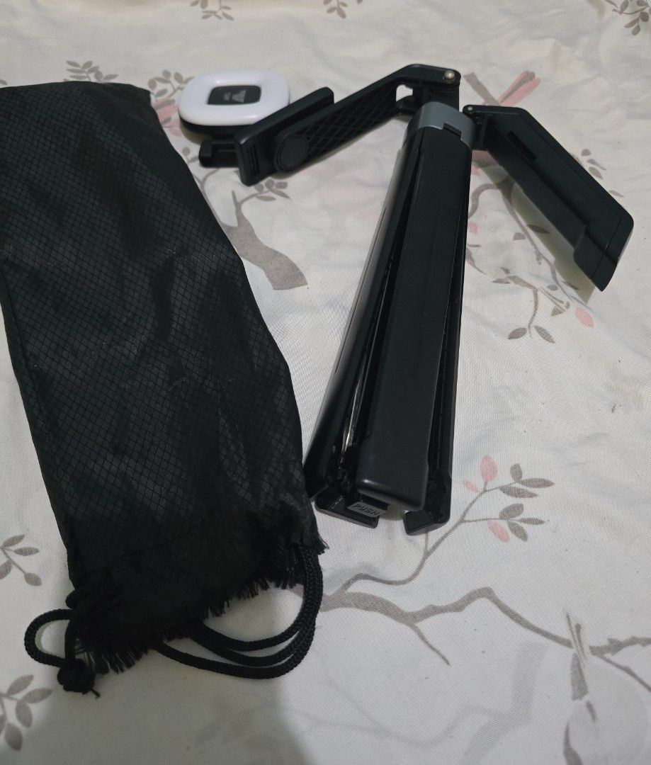 TNW Tripod expandable (Category: Tripods & Monopods) located in Cebu City. Submitted by hersidehustling (Listing ID 1457387715, Image 2). Description: TNW tripod expandable issue: I did not test the light and remote control i think it's not working, but the tripod itself is perfectly good as new..