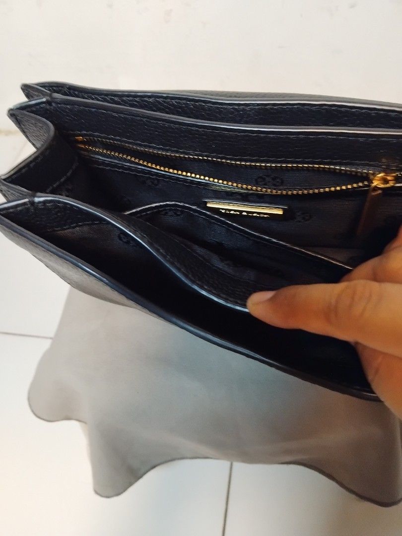 Tory Burch Kira Chevron Small Black Leather Shoulder Bag (Category: Luxury Bags & Wallets) located in Manila. Submitted by rosselegance (Listing ID 1457415607, Image 3). Description: - Authentic Tory Burch black leather bag - Elegant gold chain strap - Versatile: wear as a shoulder bag or crossbody - Spacious interior with multiple compartments and a zip pocket - Comes with original tag - Ideal for both everyday use and nights out.