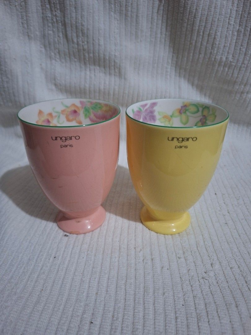 Ungaro Paris Footed Cups (Category: Coffee & Tea Tableware) located in Consolacion. Submitted by luxekerei (Listing ID 1457423860, Image 2). Description: - pink and yellow pair of Ungaro Paris footed ceramic free cups featuring a delicate floral pattern inside the rim..