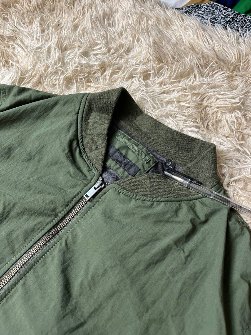Uniqlo Bomber Jacket (XL) (Category: Coats, Jackets and Outerwear) located in Baguio. Submitted by labelleferroniere (Listing ID 1457494177, Image 2). Description: Like New Condition / No Issues Dimes in the photos.
