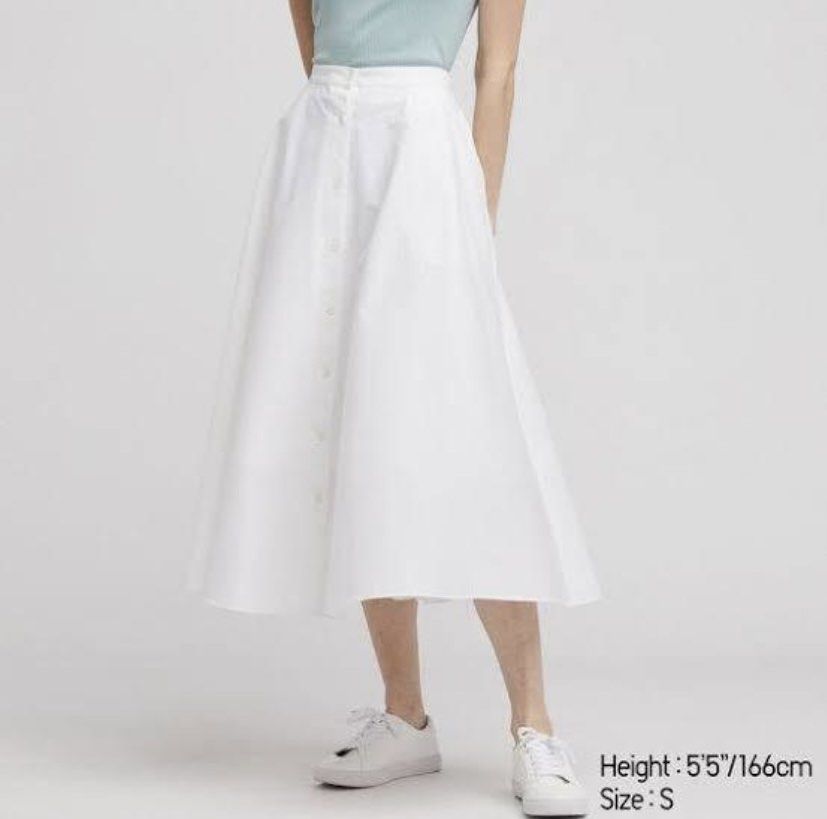Uniqlo button long skirt (Category: Other Bottoms) located in Claveria. Submitted by gailseconds (Listing ID 1457364726, Image 1). Description: - Brand: Uniqlo - Color: White - Size: M - Waist: 63-69cm - Hip: 88-94cm - Fabric: Cotton, Polyester, Polyurethane blend - Lining: 100% Polyester - Origin: Made in China - Ideal for: Everyday wear.