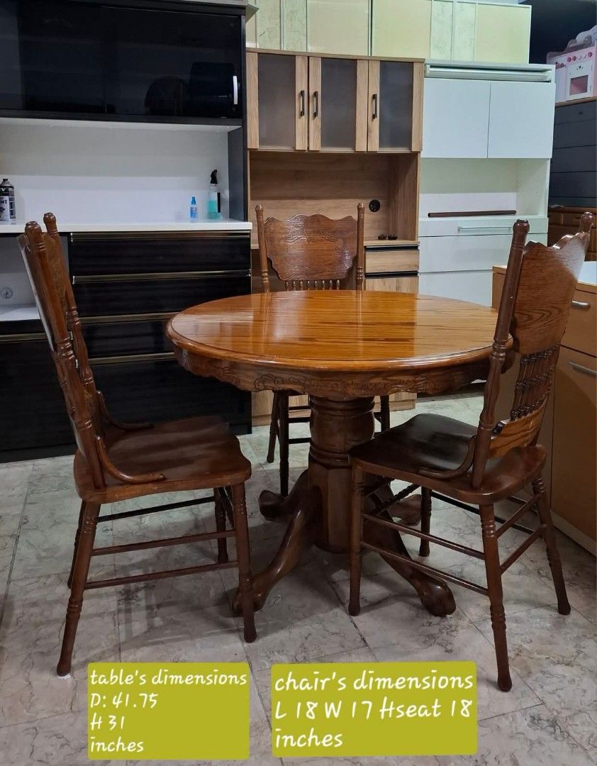 Vintage Round Dining Table and Chairs Set (Category: Tables & Sets) located in Quezon City. Submitted by dannikkishoppe2 (Listing ID 1457514262, Image 2). Description: Vintage Round Dining Table and Chairs Set‼️₱19800‼️ *in good condition *heavy, solid wood Please manage your expectations as there might be minimal flaws. Color may vary due to lighting, it may appear darker or lighter in person. Check photos first before buying. Please refrain fro