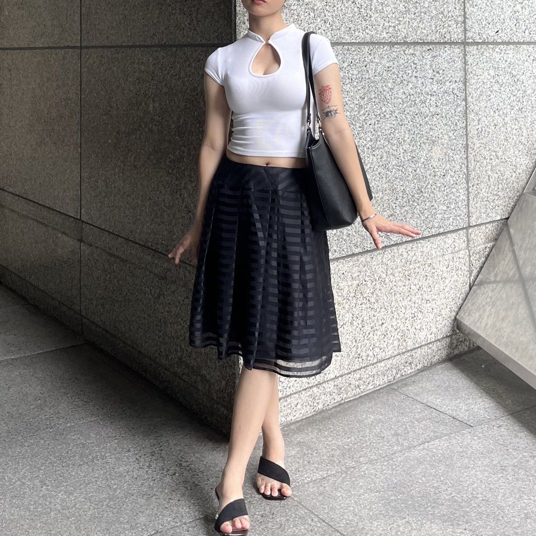 White Qipao Top (Category: Sleeveless) located in Balanga. Submitted by eijispace (Listing ID 1457458423, Image 2). Description: - White ribbed fabric - Mock neck - Chest cut-out detail - Short sleeves - xs-s.