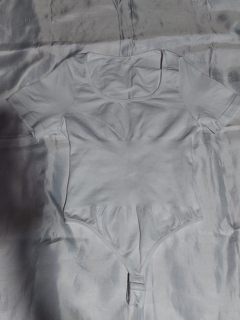 White Short Sleeve Square Neck Bodysuit (Category: Others Tops) located in Manila. Submitted by kaategnesis (Listing ID 1457444702, Image 1). Description: Super good condition Used 4 times Size: S/M.
