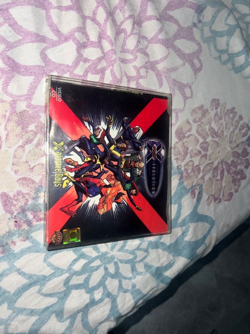 X-Men: The Animated Series - The Evolution Video CD (Category: CDs & DVDs) located in Caloocan City. Submitted by joshualari57872 (Listing ID 1457492263, Image 2). Description: - X-Men: The Animated Series - The Evolution Video CD - Features the classic X-Men lineup - Perfect for fans of the beloved animated series - Comes with original case and disc - Essential item for X-Men collectors Presyuhan nyo na.