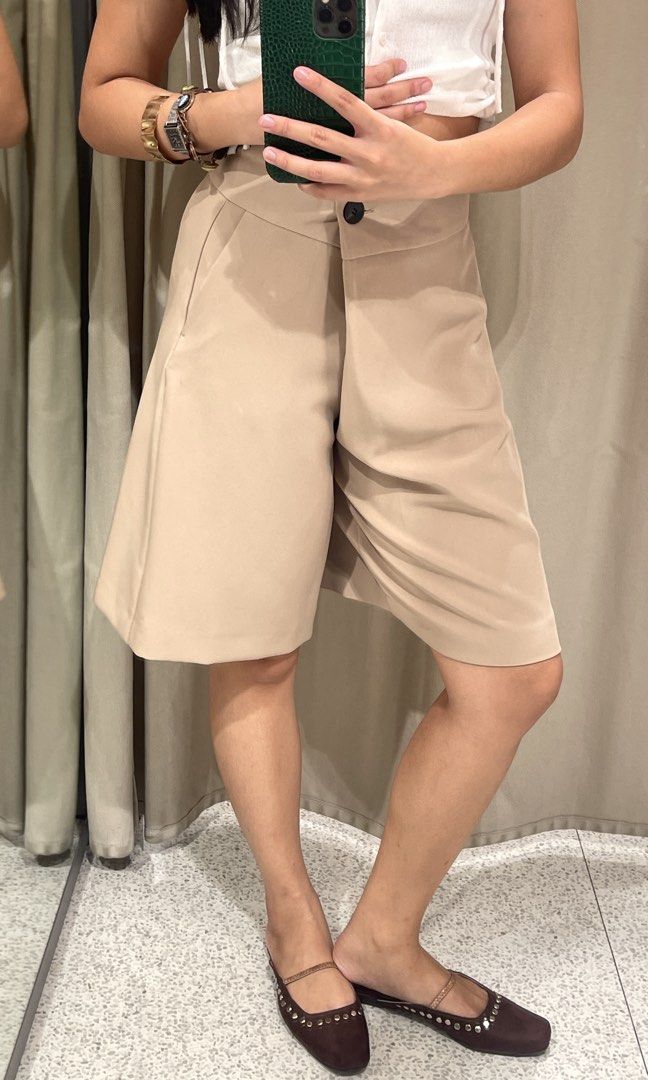 Zara Chic Beige Bermuda Shorts with Button Detail (Category: Other Bottoms) located in Binan City. Submitted by matchimarina (Listing ID 1457493382, Image 2). Description: - Bought last Jan for ₱2500+ - Size S - Super love this shorts I wish I got a smaller size. Wouldn’t really let this go if I purchased the right one 💔 - In really excellent condition 💕 There’s a few loose threads but not rly noticeable in person .