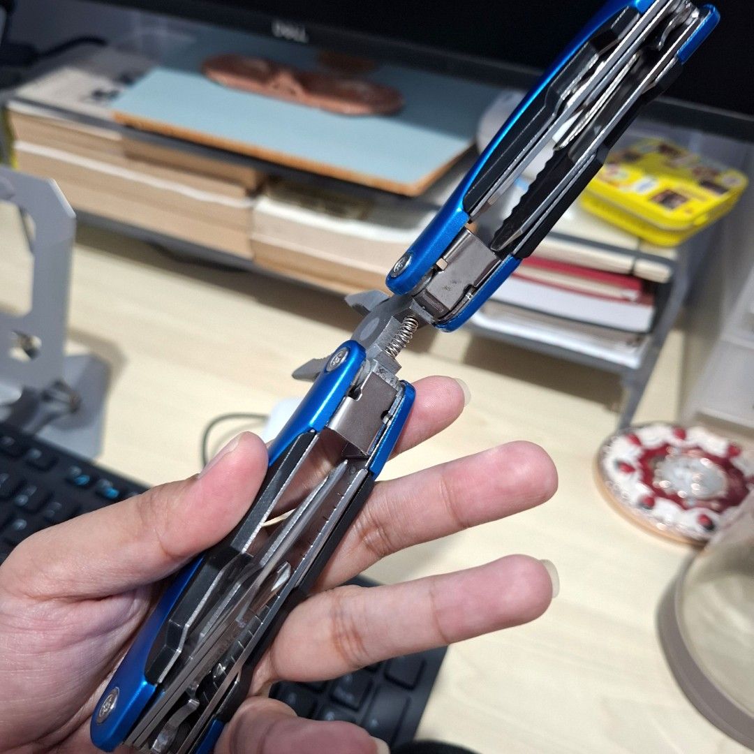 14functions Multi-tool Plier foldable (Category: Home Improvement Tools & Accessories) located in Quezon City. Submitted by an.marie (Listing ID 1457576927, Image 3). Description: multi-tool with pliers, knife, and other folding tools. Includes a black fabric pouch. Compact and portable for everyday use. Perfect for quick fixes..