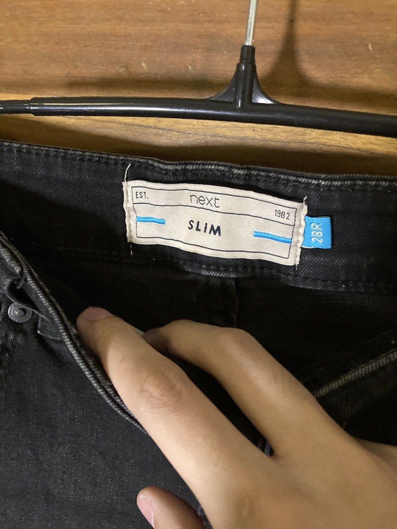 ₱10 + Shipping Fee. (Category: Jeans) located in Batangas. Submitted by declutteringvon (Listing ID 1457662602, Image 2). Description: - Brand: Next - Color: Black - Fit: Slim Fit - Size: 28R - Style: Classic five-pocket - Features: Versatile for everyday wear, easily pairs with any top - Benefit: A great staple piece for your wardrobe.