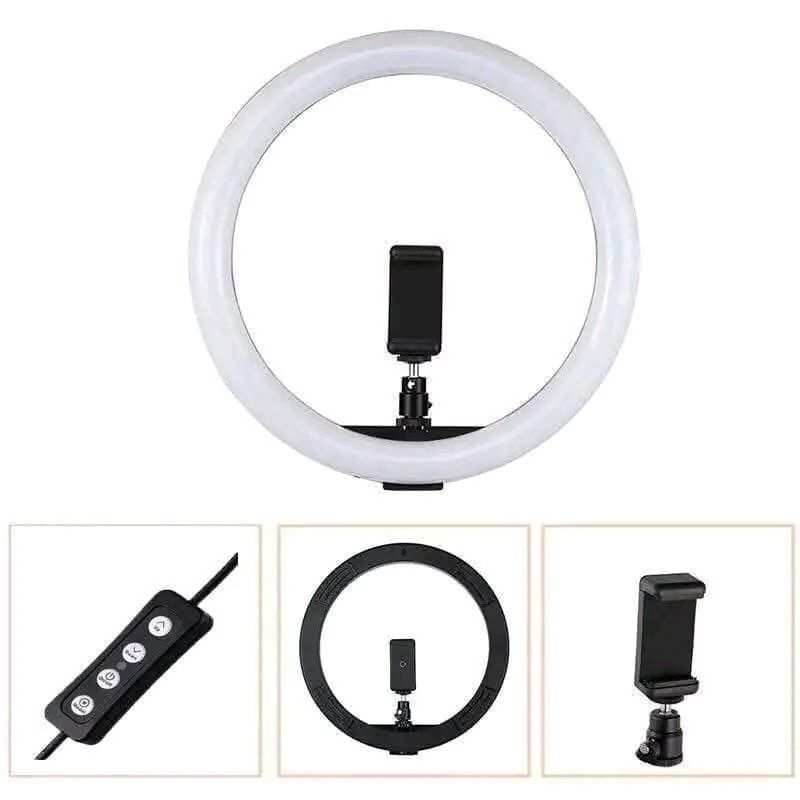 26cm Ring Light with 210cm Tripod Stand & Phone Holder (Category: Lighting & Studio Equipment) located in Manila. Submitted by marvieobordo (Listing ID 1457549593, Image 3). Description: - 26cm Ring Light - 210cm Adjustable Tripod Stand - Universal Phone Clip (fits horizontally or vertically) - Perfect for selfies, vlogging, makeup tutorials, and more - Easy to set up and adjust angle - Includes remote for convenient light control - Essential for