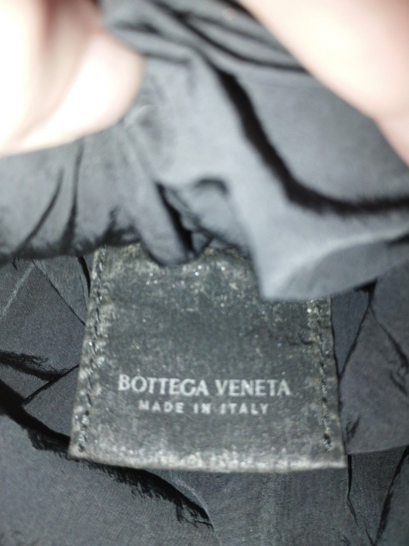 ✨ Bottega Veneta men's Flat pouch with triangular bag strap (Category: Luxury Bags & Wallets) located in Santa Rosa. Submitted by leShoppe (Listing ID 1457598681, Image 3). Description: 🗝️this bag features an all-over chevron or textured canvas/nylon pattern. This Bottega Veneta flat pouch design closely resembles vintage or pre-owned monogram pieces from brands like the Gucci GG Canvas Flat the metal sliding bar marked with the "PULL" text and 