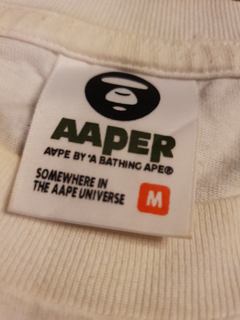 Aape graffiti design (Category: Tshirts & Polo Shirts ) located in San Fernando. Submitted by retro.district. (Listing ID 1457660143, Image 3). Description: - Aape graffiti design - Size: Medium to large - Condition: Good - issue: hairlines front print.