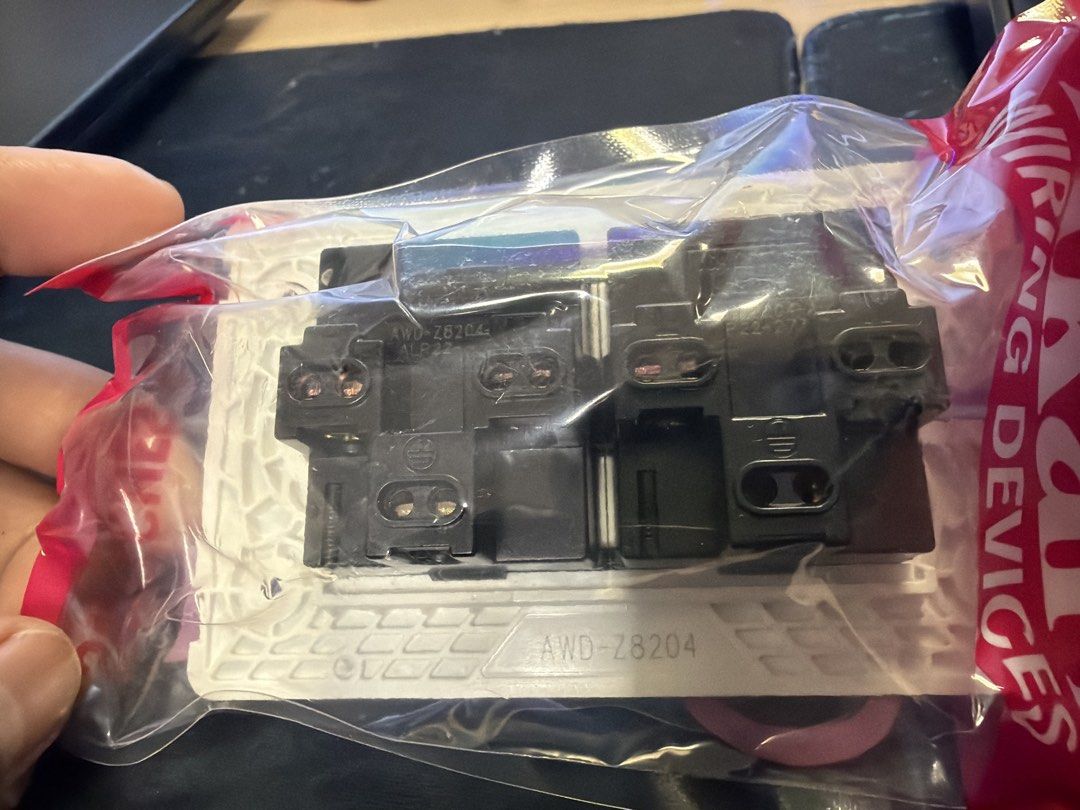 Akari 2-Gang Universal Socket 10A 250V (Category: Electrical, Adaptors & Sockets) located in Manila. Submitted by safestorm.886e55 (Listing ID 1457582028, Image 2). Description: - Akari 2-gang Universal Socket - Model: AWD-Z8204 - Rating: 10A, 250V - Compatible with various plug types - Includes a 10-year guarantee - Ideal for home and office applications.