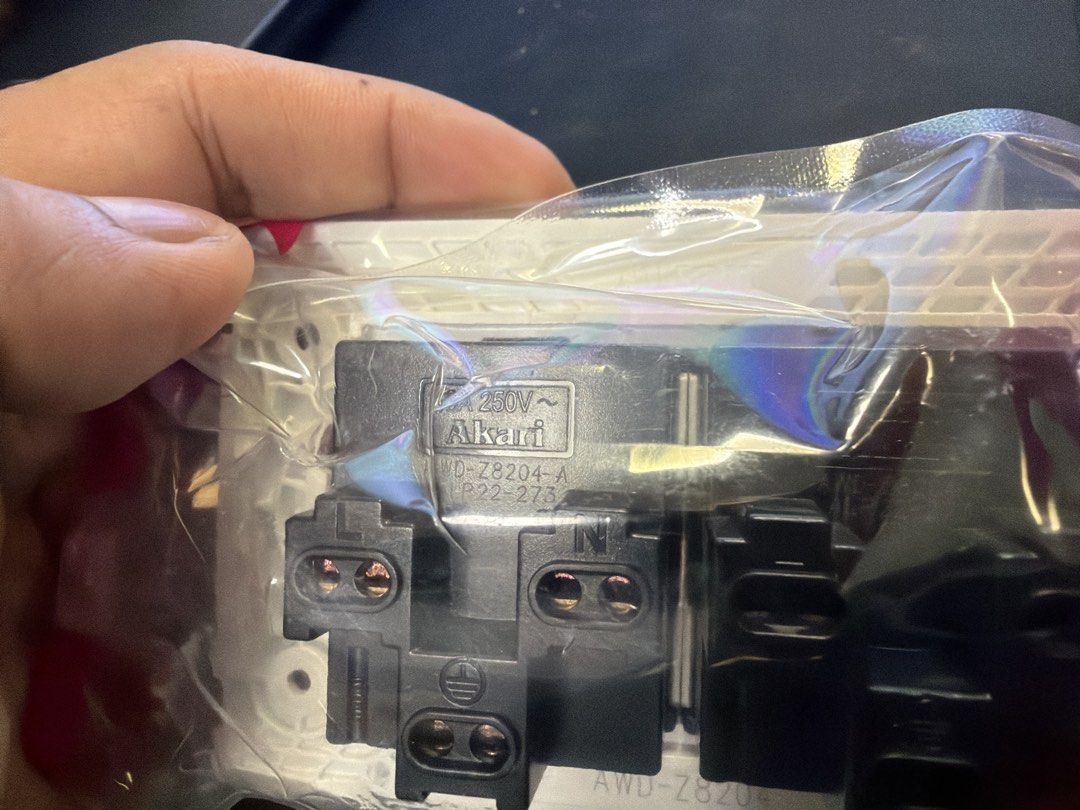 Akari 2-Gang Universal Socket 10A 250V (Category: Electrical, Adaptors & Sockets) located in Manila. Submitted by safestorm.886e55 (Listing ID 1457582028, Image 3). Description: - Akari 2-gang Universal Socket - Model: AWD-Z8204 - Rating: 10A, 250V - Compatible with various plug types - Includes a 10-year guarantee - Ideal for home and office applications.