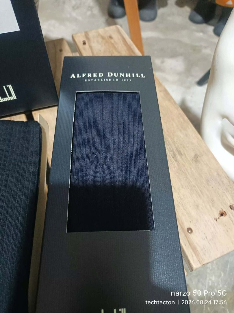 Alfred Dunhill Men's Socks 2 pairs (Category: Socks) located in Santo Tomas. Submitted by pickers_corner (Listing ID 1457518936, Image 3). Description: DUNHILL business Socks size 25 good as new condition - Brand: Alfred Dunhill - Color: Black - Design: Ribbed - Condition: New with original packaging - Material: High-quality - Style: Perfect for both formal and casual occasions - A timeless addition to any wardrobe.