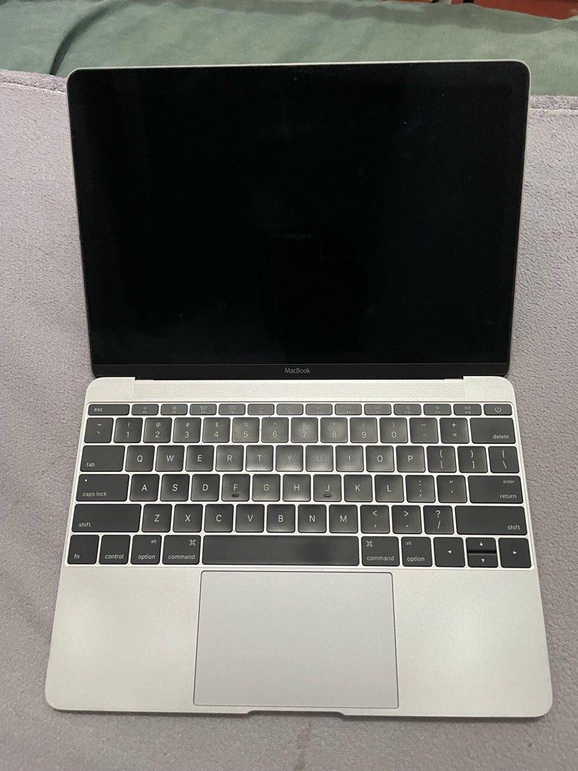 Apple MacBook A1534 Silver (with defect) (Category: Laptops & Notebooks) located in Mandaluyong City. Submitted by hltabunda (Listing ID 1457684034, Image 2). Description: REFORMATTED - Silver Apple MacBook - Model: A1534 - Unit: MacBook (Retina, 12-inch, Early 2015) REFER TO LAST PIC TO SEE COMPLETE SPECS WITH DEFECT (KEYBOARD NOT WORKING) - lady-owned - trackpad is working - makunat pa battery - free hard case (Php 1,XXX price) - no charger, un
