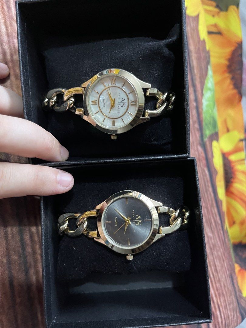 Axis studio watch Quartz Gold Chain Link Watches (2 pcs) (Category: Women's Watches) located in Manila. Submitted by rosechan429 (Listing ID 1457594984, Image 2). Description: Axis - Gold chain link bands - Watch 1: White face with Roman numerals - Watch 2: Dark face with gold hands 2k each .