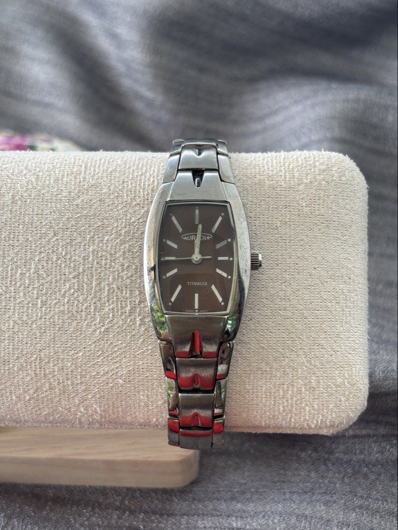 Aureole Titanium Watch (Category: Women's Watches) located in Puerto Princesa. Submitted by dailywristual (Listing ID 1457576354, Image 3). Description: Rare Aureole Titanium Watch - Durable Titanium Band with Deep Brown Watch Face - Model Number: 30SW-4431 (on back) - Classic Design, Perfect for Everyday Wear - 25 centavos sized dial, fits up to 7 inches wrist size - visible hairline scratches on strap - comes with standard box and polishing clo