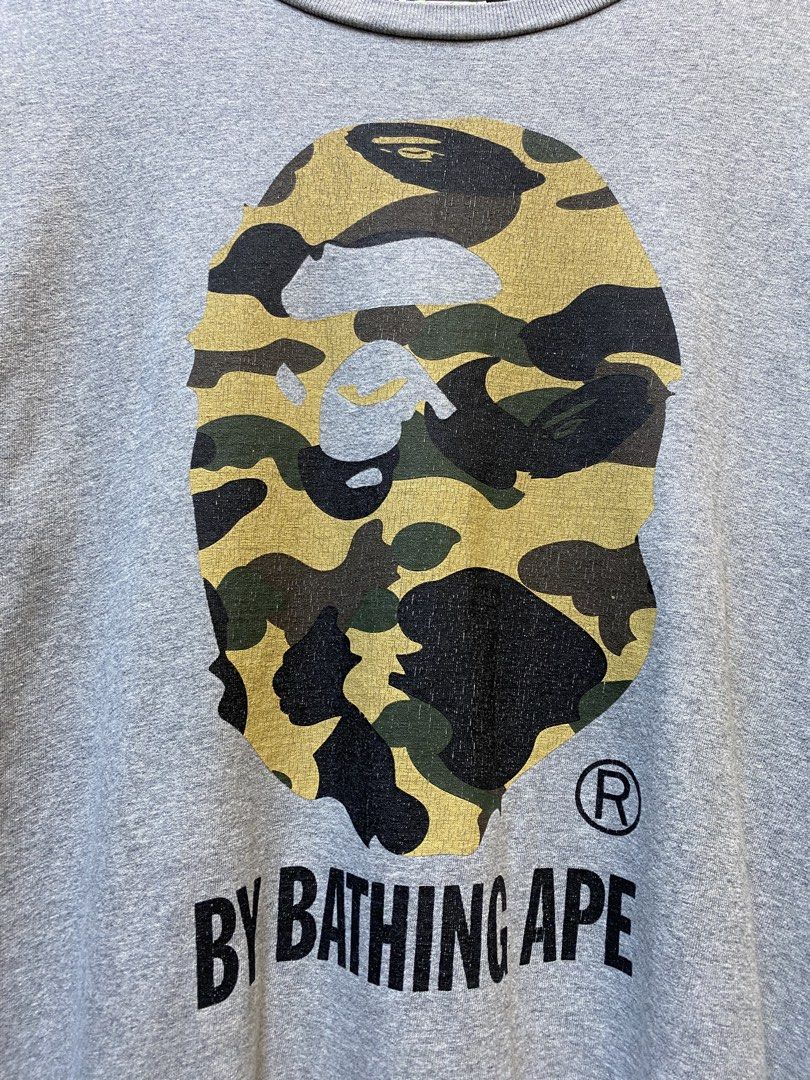 AUTHENTIC BAPE BIG HEAD (Category: Tshirts & Polo Shirts ) located in Makati City. Submitted by drip.poww (Listing ID 1457589869, Image 3). Description: - Authentic Bape - Color: Gray - Size: Meduim - Dimes: 21x27 - Authentic - Minimal hairlines - Excellent condition - Need wash, fresh from bale - Material: 100% Cotton Please don’t expect too much—these are thrifted (ukay) items. 😊 !!STILL NEGOTIABLE!!.