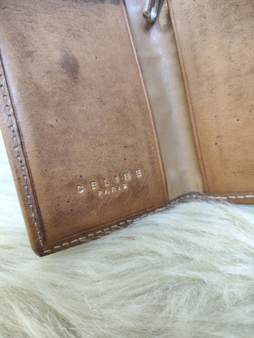 Authentic CELINE Macadam PVC Leather key case (Category: Luxury Bags & Wallets) located in Rizal. Submitted by hsiri1128 (Listing ID 1457552748, Image 3). Description: 💯✔️Legit 📌From Japan Box ISSUE : Need lagyan ng mga hooks inside. no cracks on leather. hardwares still gold ✨Fiocchi italy snap button.