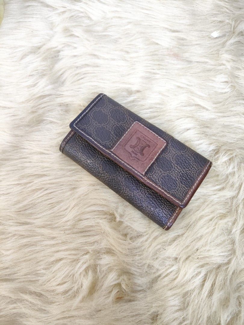 Authentic CELINE Macadam PVC Leather key case (Category: Luxury Bags & Wallets) located in Rizal. Submitted by hsiri1128 (Listing ID 1457552748, Image 1). Description: 💯✔️Legit 📌From Japan Box ISSUE : Need lagyan ng mga hooks inside. no cracks on leather. hardwares still gold ✨Fiocchi italy snap button.