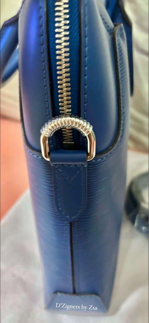 Authentic LV Blue Epi Briefcase (Category: Luxury Bags & Wallets) located in Quezon City. Submitted by DZignersbyZsa (Listing ID 1457606899, Image 3). Description: Authentic LV Briefcase in Blue epi leather Prestine condition With long strap, qr sticker and gift card .