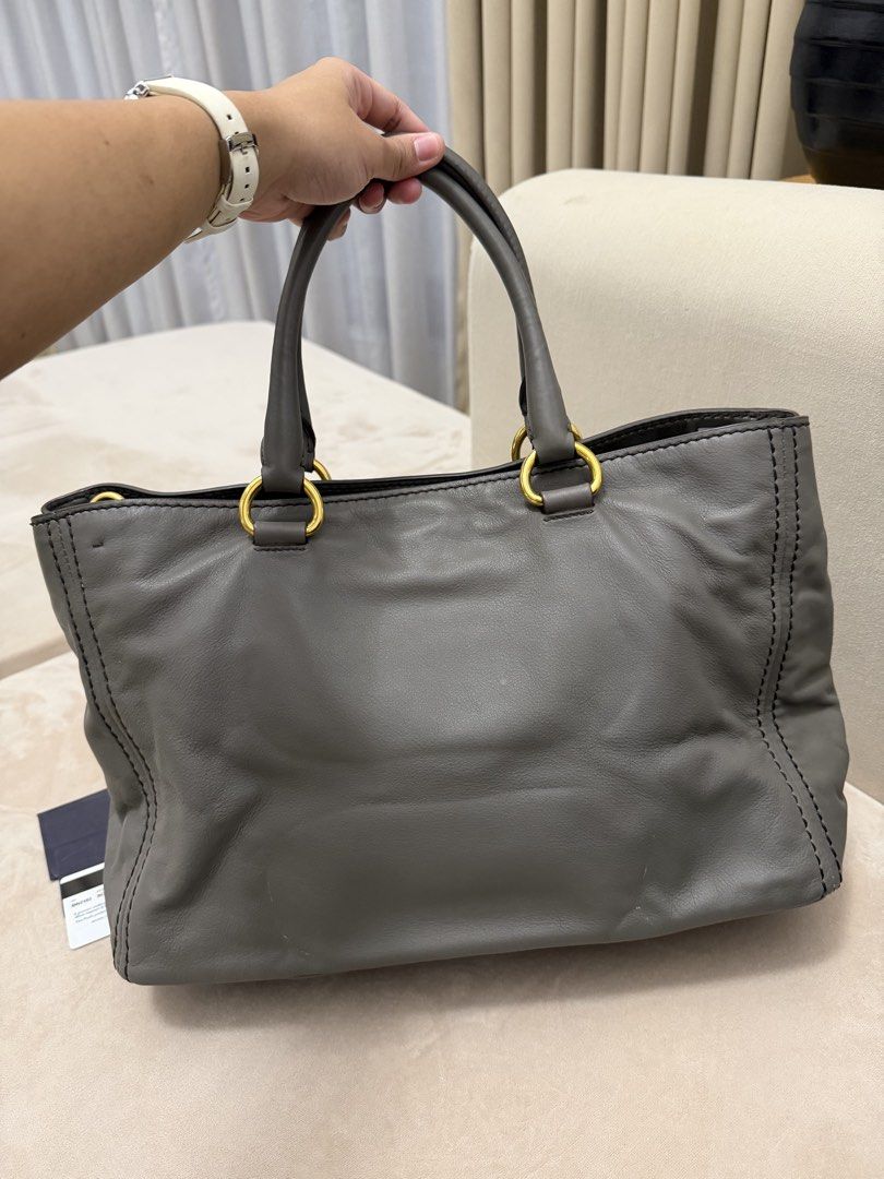 Authentic Prada Soft Calfskin Two-way Bag (Category: Luxury Bags & Wallets) located in Manila. Submitted by maria_2326 (Listing ID 1457624352, Image 3). Description: Prada Soft Calfskin Two-way Bag Guarantee Authentic Inclusions: Sling, Booklet and Prada Card, Certificate of Authentication Location: Manila/QC.