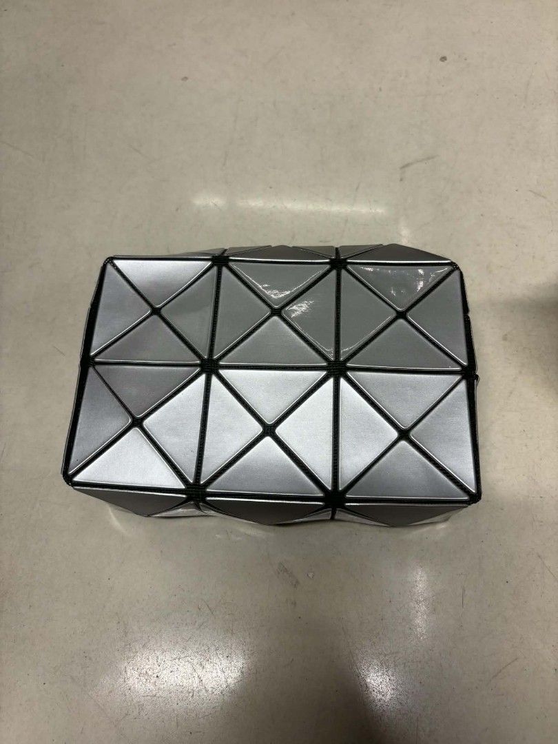 BA0BA0 ISSEY MIYAKE (Category: Luxury Bags & Wallets) located in Navotas City. Submitted by DalVintage (Listing ID 1457533171, Image 1). Description: baobao issey miyake cuboid bag with extra sling small bag.