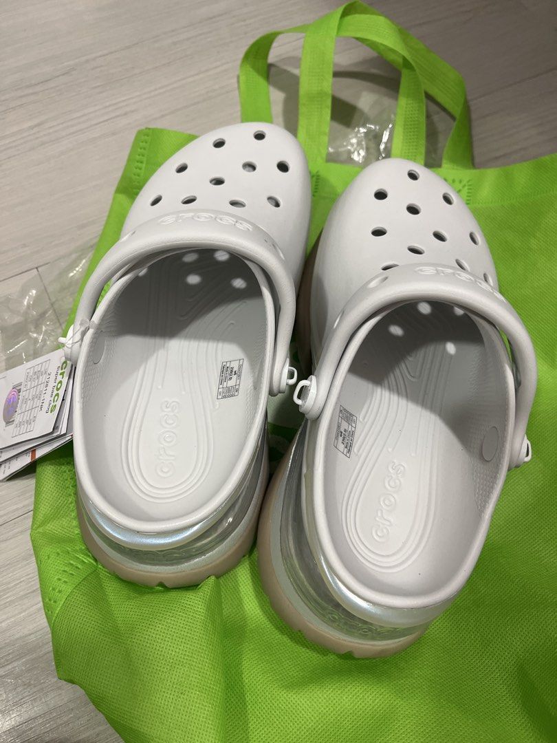 Bae Clogs Off White Crocs with Translucent Sole - Size 6 (Category: Slippers and slides) located in Pasig City. Submitted by melaiski28 (Listing ID 1457609026, Image 2). Description: - White Crocs Classic Clogs - Women's Size 6 - Features a cool translucent sole - Includes the iconic pivoting strap - Signature Crocs comfort for all-day wear - Comes with a complimentary green reusable bag - Ideal for everyday casual outings.