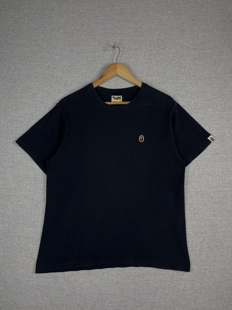 Bape Shirt (Category: Tshirts & Polo Shirts ) located in Guimba. Submitted by thriftandthrive19 (Listing ID 1457546723, Image 1). Description: Bape Size: Medium (dimension in inches) Width: 20.5 Length: 26.5 Condition: Excellent Issue: None Color rate: 9.