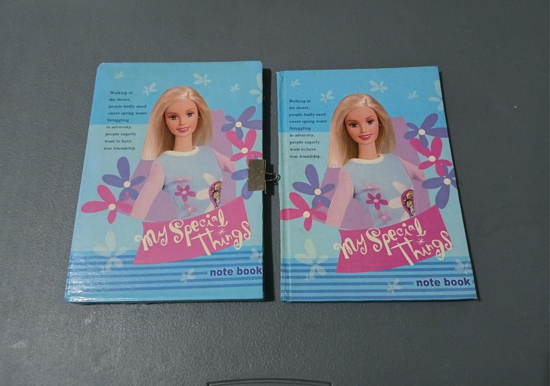 Barbie-themed "My Special Things" lockable diary/notebook (Category: Stationery & School Supplies) located in Bulacan. Submitted by honhonliz (Listing ID 1457617759, Image 1). Description: Cover Design: Features a late-1990s to early-2000s era Barbie illustration set against a light-blue background decorated with pink and violet flowers. Front Cover Text: It features the stylized title text "My Special Things" and a smaller generic tag reading "n
