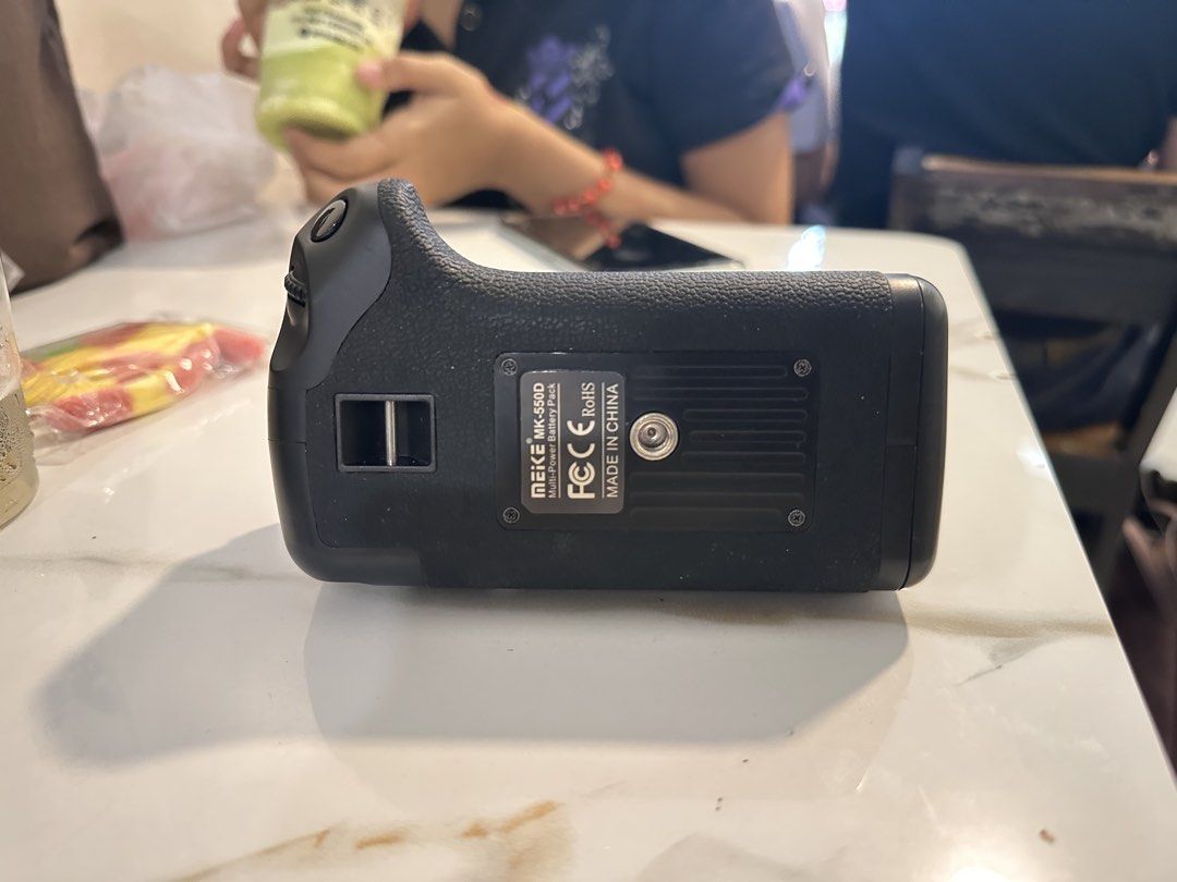 Battery grip for Canon 550d (Category: Batteries & Chargers) located in Manila. Submitted by zealstone_46c2c5 (Listing ID 1457660415, Image 2). Description: No issue .