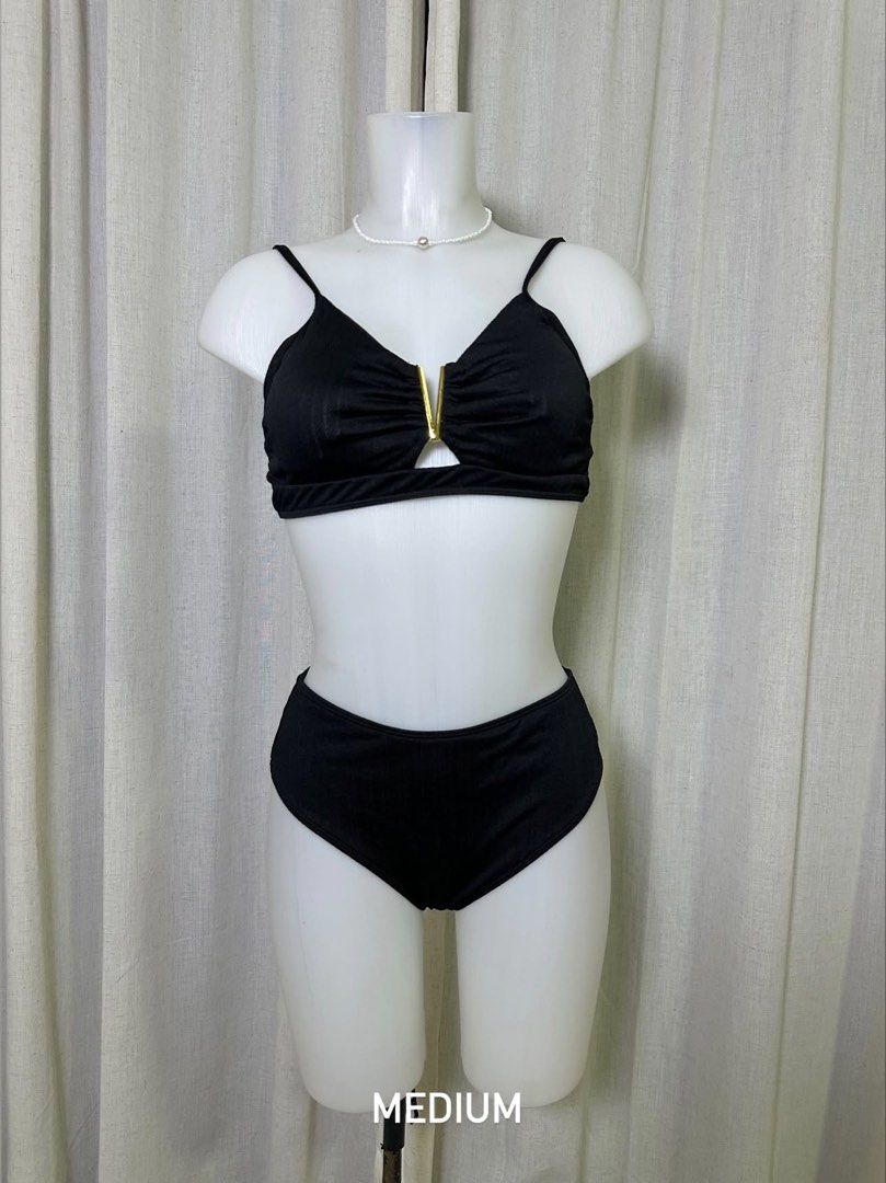 Black High Waisted Bikini with Gold Detail - Medium (Category: Bikinis & Swimsuits) located in Baybay. Submitted by comicowl (Listing ID 1457562197, Image 1). Description: - Stylish black bikini set - Flattering high-waisted bottoms - Top features a cute gold zipper detail in the front - Adjustable straps for a perfect fit - Material has a subtle sheen - Ideal for beach or pool outings.