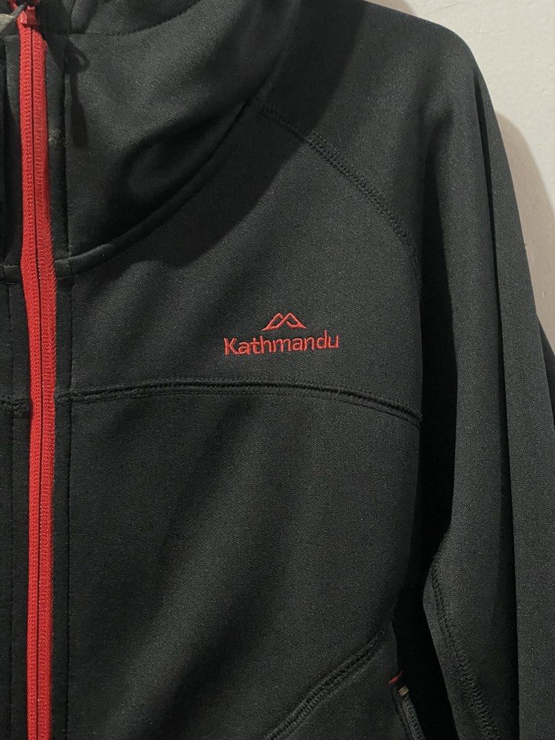 Black Kathmandu Full-Zip Hooded Jacket (Category: Coats, Jackets and Outerwear) located in Baguio. Submitted by everafterbgo (Listing ID 1457695931, Image 3). Description: - Black Kathmandu hooded jacket - Full zip closure with red accents - Two front pockets - Ribbed cuffs and hem - Ideal for outdoor activities or casual wear - Comfortable and practical.