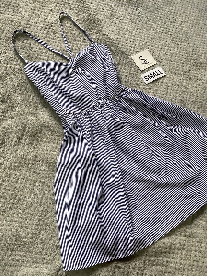Blue and White Striped Mini Dress (Category: Dresses) located in Ajuy. Submitted by savvyclassics (Listing ID 1457650664, Image 2). Description: crisscross back Waist:24-25 L:26 from kilikili.
