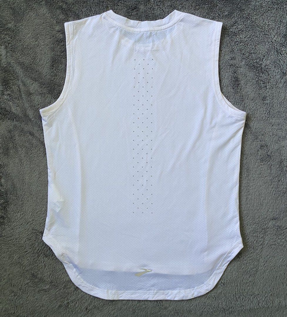 Brooks Reflective Dot Point Running Tank Top (Category: Activewear) located in Cebu City. Submitted by markvoid (Listing ID 1457667386, Image 3). Description: Brooks Reflective Dot Point Running tank Top >Excellent Condition >Like New >No Flaws >Color Rate: 10/10 >Color May Vary Due To Light >Width: 16 >length: 19 Front, 21 Back >Size: Small >Price+SF >MOP: Gcash/Bank Transfer >Shipping: J&T Mandaue City.