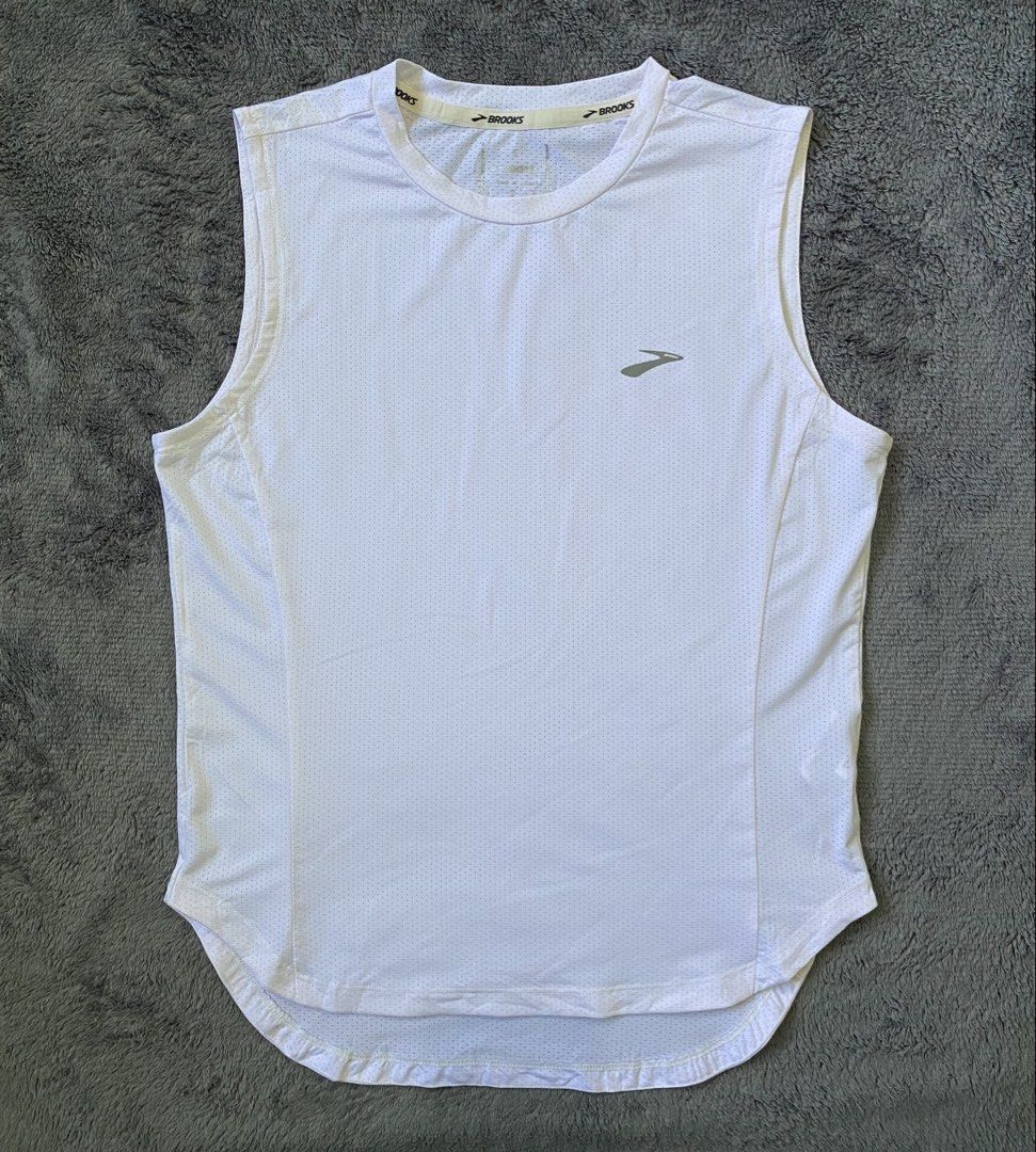 Brooks Reflective Dot Point Running Tank Top (Category: Activewear) located in Cebu City. Submitted by markvoid (Listing ID 1457667386, Image 1). Description: Brooks Reflective Dot Point Running tank Top >Excellent Condition >Like New >No Flaws >Color Rate: 10/10 >Color May Vary Due To Light >Width: 16 >length: 19 Front, 21 Back >Size: Small >Price+SF >MOP: Gcash/Bank Transfer >Shipping: J&T Mandaue City.