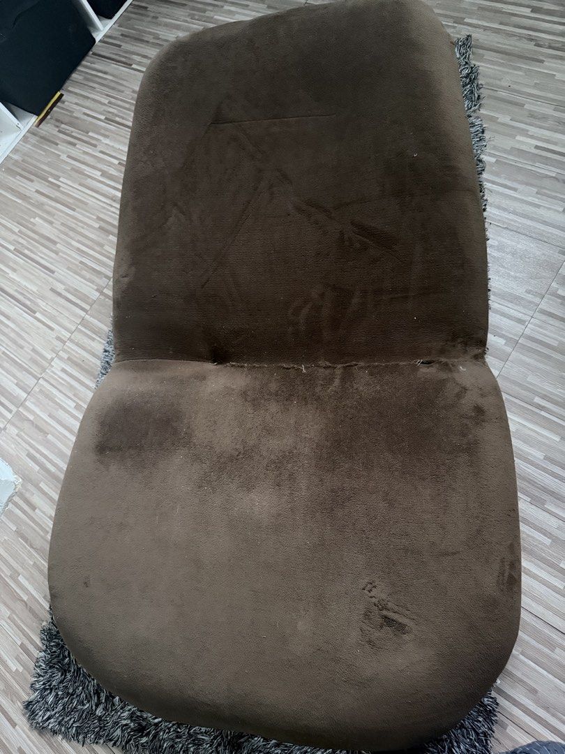 Brown Reclining Floor Chair (Category: Chairs) located in Quezon City. Submitted by sellantroe (Listing ID 1454437577, Image 2). Description: - Tear in the middle when fully reclined - Foam filling is no longer as full - Spring inside can be slightly felt when seated.