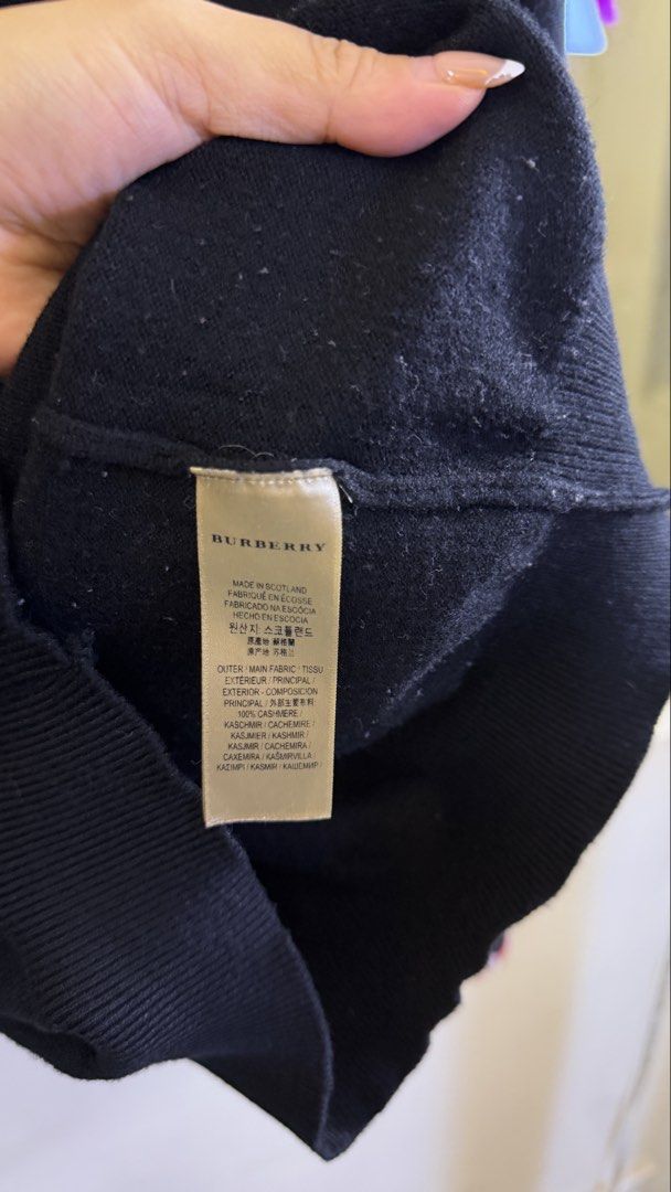 Burberry Black Crewneck Sweater (Category: Coats, Jackets and Outerwear) located in Paranaque City. Submitted by preluxeshop_ph (Listing ID 1457685445, Image 3). Description: Burberry Black Crewneck Sweater - Made in Scotland - Iconic embroidered Burberry Equestrian Knight logo on chest - Versatile for dressing up or down - Perfect for layering - Timeless wardrobe essential 🔥CHECK OUT MY PROFILE FOR 100+ OTHER HIGH-END CURATED STREETWEAR, COATS 