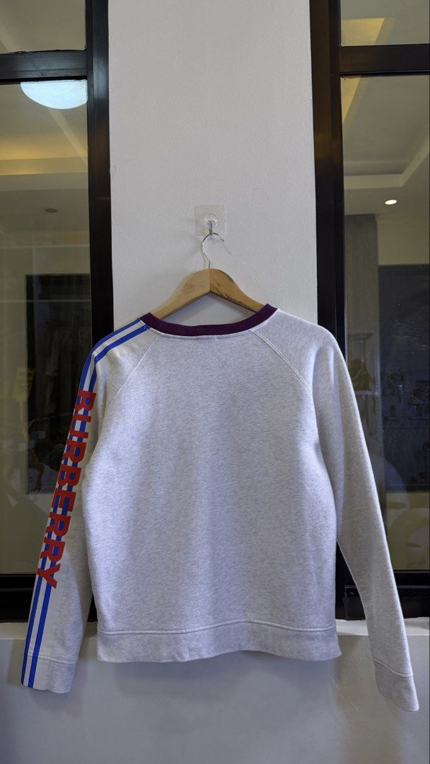 Burberry Grey Sweatshirt with Sleeve Logo (Category: Coats, Jackets and Outerwear) located in Paranaque City. Submitted by preluxeshop_ph (Listing ID 1457685310, Image 3). Description: Burberry Grey Sweatshirt with Sleeve Logo Unisex Size Small to Medium. Good as brand new. 🔥CHECK OUT MY PROFILE FOR 100+ OTHER HIGH-END CURATED STREETWEAR, COATS AND VINTAGE DROPS!.