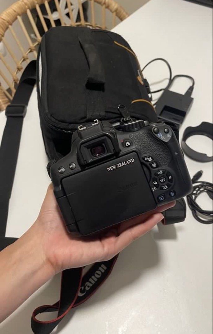 Canon EOS 750D DSLR Camera with Accessories (Category: Cameras) located in Muntinlupa City. Submitted by kshmrbnk (Listing ID 1457610148, Image 1). Description: -Bought in New Zealand - Canon EOS 750D DSLR camera -Touchscreen Display - 18-55mm lens included - Accessories: lens caps, lens hood, charger, battery, camera strap - Includes Lowepro camera bag - Features a flip-out screen - In good working condition, hindi gaano nagamit talaga -Twice ln