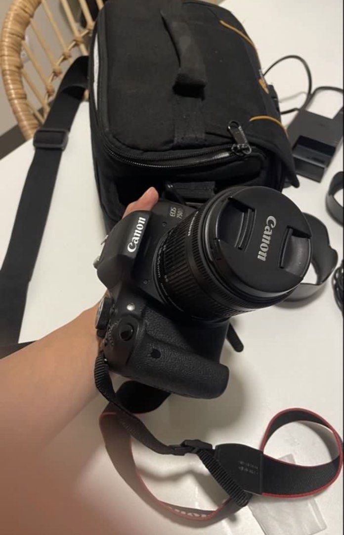 Canon EOS 750D DSLR Camera with Accessories (Category: Cameras) located in Muntinlupa City. Submitted by kshmrbnk (Listing ID 1457610148, Image 2). Description: -Bought in New Zealand - Canon EOS 750D DSLR camera -Touchscreen Display - 18-55mm lens included - Accessories: lens caps, lens hood, charger, battery, camera strap - Includes Lowepro camera bag - Features a flip-out screen - In good working condition, hindi gaano nagamit talaga -Twice ln