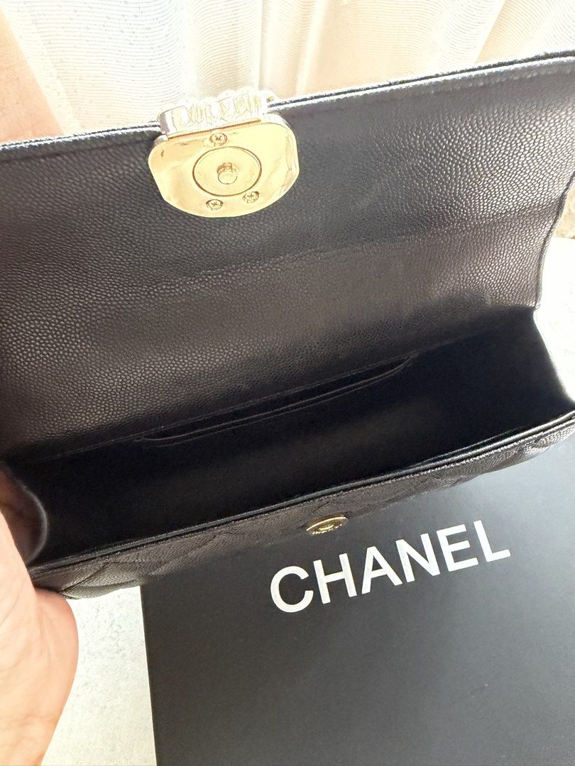 Chanel Mini Flap Bag with Chain Top Handle (Category: Luxury Bags & Wallets) located in Manila. Submitted by babycherub (Listing ID 1457603176, Image 2). Description: - Black Caviar Leather - White gold hardware - Mini size - Can fit card holder, lippies, compact powder, and iPhone 17 Pro - Inclusive of Box - Elite Singapor Quality (close to Store Quality) - Ideal for the girlies who are not particular with the authenticity. I’ve use this couple 