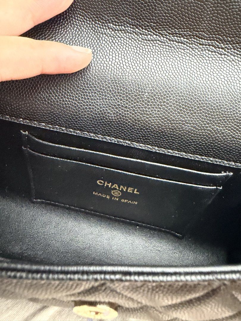 Chanel Mini Flap Bag with Chain Top Handle (Category: Luxury Bags & Wallets) located in Manila. Submitted by babycherub (Listing ID 1457603176, Image 3). Description: - Black Caviar Leather - White gold hardware - Mini size - Can fit card holder, lippies, compact powder, and iPhone 17 Pro - Inclusive of Box - Elite Singapor Quality (close to Store Quality) - Ideal for the girlies who are not particular with the authenticity. I’ve use this couple 