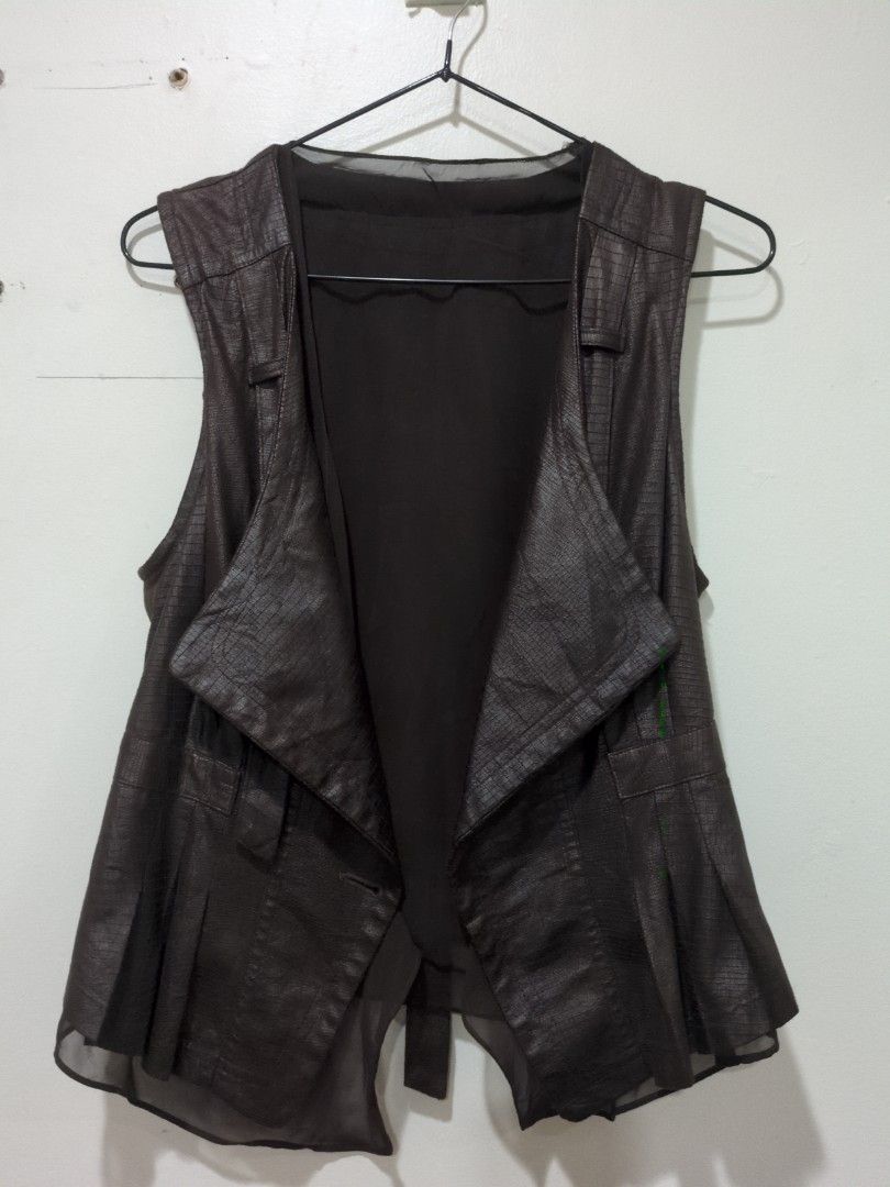Chic Sleeveless Blazer Vest (leather like) (Category: Coats, Jackets and Outerwear) located in Mandaluyong City. Submitted by bbcatham (Listing ID 1457630526, Image 1). Description: Super chic in actual. HQ No flaws! Size: Small to Med Condition: 9/10 PS. You can add buttons if you like..