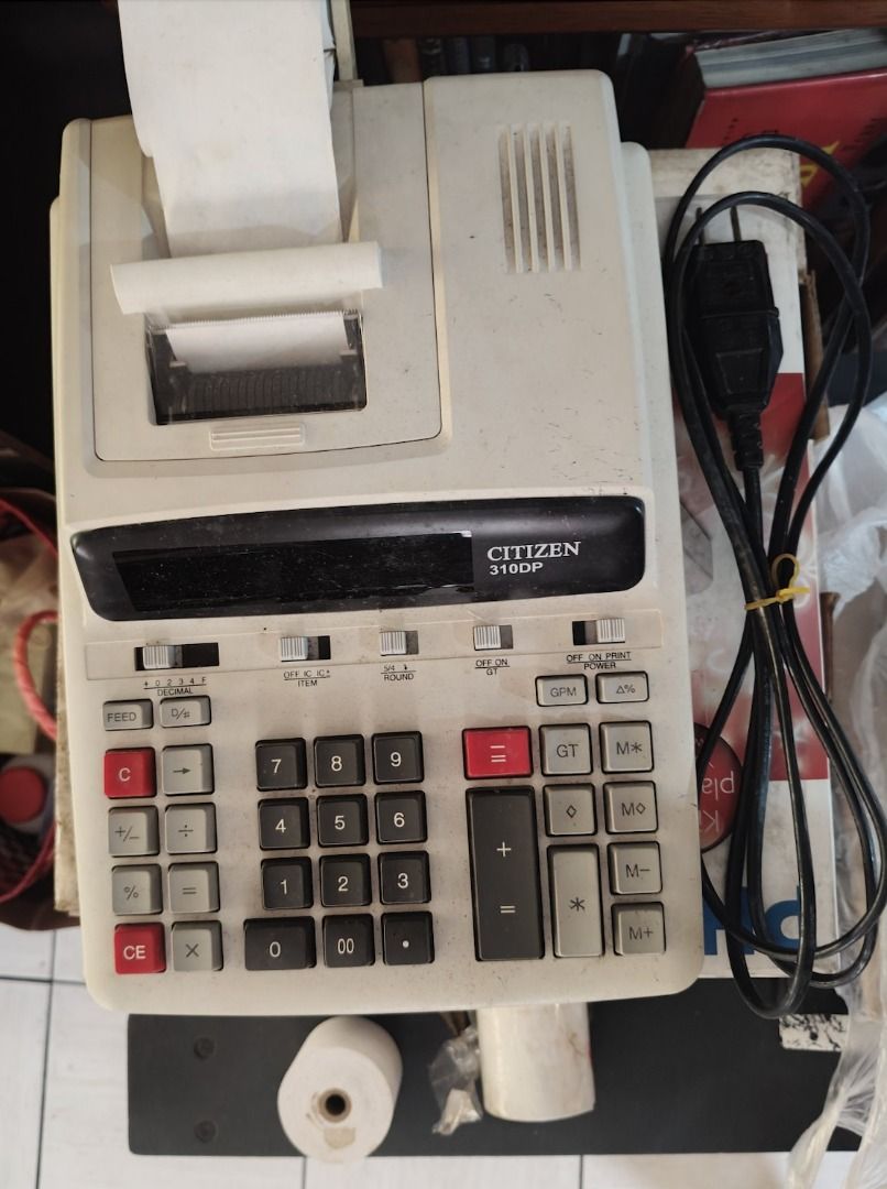 DISCOUNTED = CITIZEN 310DP Vintage/Legacy Printing Adding Machine (Category: Office & Business Technology) located in Quezon City. Submitted by oddduck02 (Listing ID 1457576735, Image 1). Description: - CITIZEN 310DP Printing adding machine with adding machine paper tapes attached. - With extra 5pcs adding machine paper tapes included - Made in Thailand - 220V - Reason for selling - Cleaning house - Needs paper ink change since numbers are not as